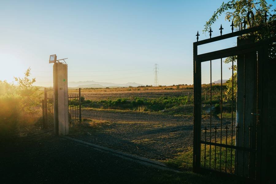 Gated entrance at dusk